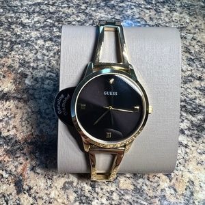 Gold Women’s Guess Watch
